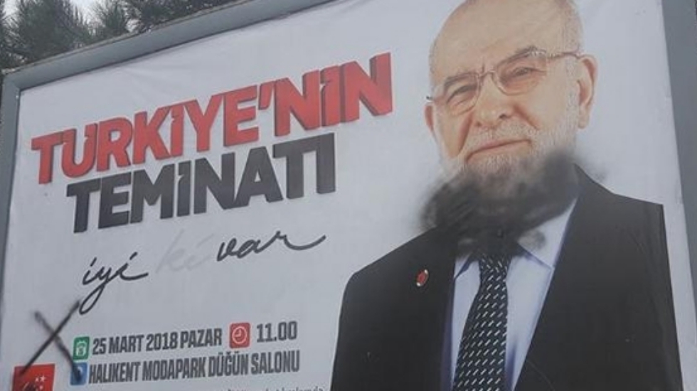 Temel Karamollaoğlu afişlerine çirkin saldırı