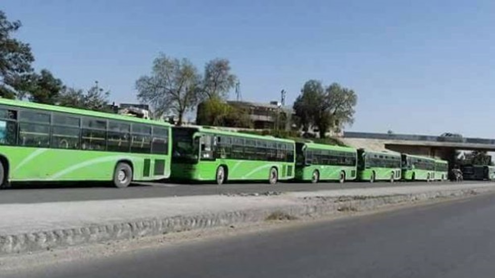 Cihatçıların teslim olması üzerine yeşil otobüsler Doğu Guta’ya geldi